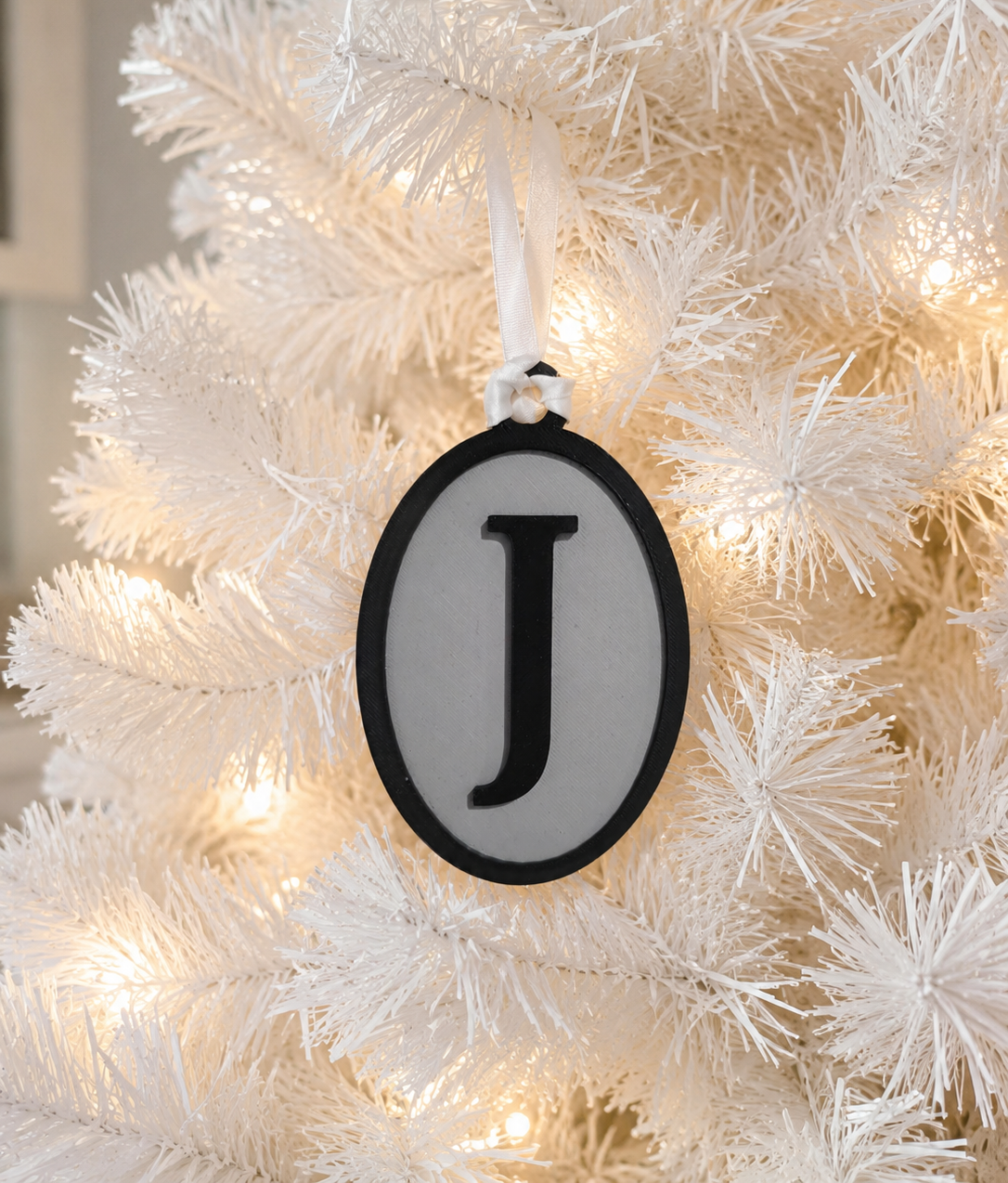 OVAL INITIAL ORNAMENT